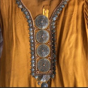 COPY - COPY - 3 piece shalwar suit , soft chiffon with metal work on it .